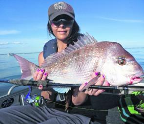 Tornz with a lovely Port Phillip snapper that she caught on a light spin outfit.